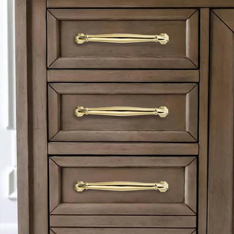 10 Pack Polished Brass Cabinet Pulls Heavy Duty Solid Hardware 5 Inch Center to Center Handles for Dressers Drawers Cupboards Gold Finish on wooden dresser.