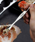 Using fork from Complete 21 Piece Seafood Tools Set With Six Crab Crackers, Six Lobster Shellers, Six Wide Crab Forks, Two Seafood Scissors