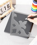 Ornate Corner Router Template Set Two Piece Acrylic Inlay Jig Kit With Precision Tracing Stencil Guide on black surface.