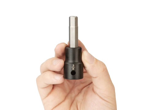 Hand holding Badass 1/2 Inch Drive X 3/8 Inch Hex Impact Bit Socket Made From Tough S2 Steel, designed for tough jobs.