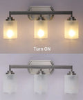 Three Light Brushed Nickel Vanity Light With Frosted Glass Shades, Wall Mount Sconce For Bathroom And Over Mirror, Modern Indoor Lighting for hallway, living room, or entryway, dope finish, lit and unlit view.