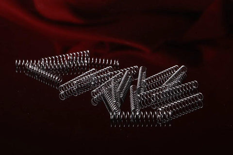 Stainless Steel Compression Springs Set, 20-Piece Assortment, 1.6 Inch Length, displayed on dark background