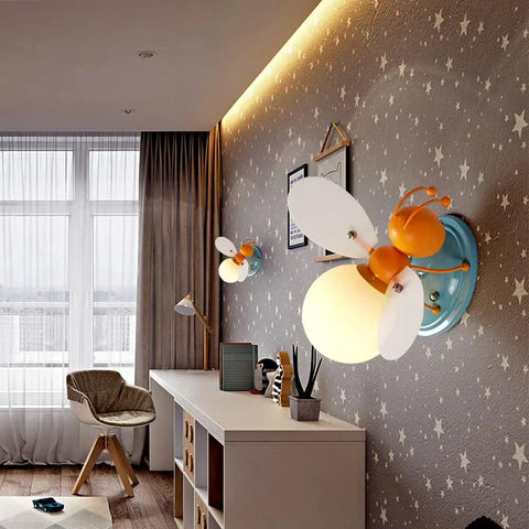 Bee Shaped Kids Wall Light With Glass Shade Cute Sconce For Girls And Boys Bedroom Hardwired Night Light UL Listed Socket And Wire Easy Install Modern Decor For Reading And Playtime in a children's room setting