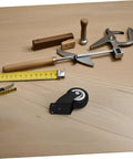 Built Tough Heavy Duty Sliding Door Wheels Featuring Whisper Quiet Rollers For Barn Door Hardware on a workbench with tools.