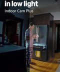 Indoor Cam Plus demonstrating night vision feature with person in kitchen, showcasing Top Shelf Battery Powered Doorbell Bundle Featuring Crisp 2K HD Footage And Rock Solid Wireless Indoor Security Cam For Peaceful Home Watching And Hella Quick Setup.