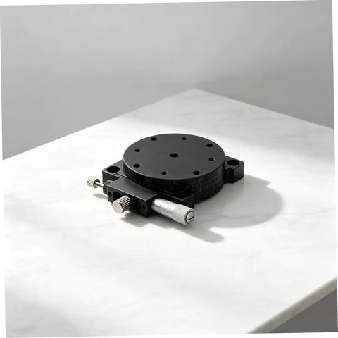 Insanely Steady Manual Precision Rotation Stage With Hella Smooth 60mm Aluminum Base and Ridiculously Precise Dial Control on marble surface.