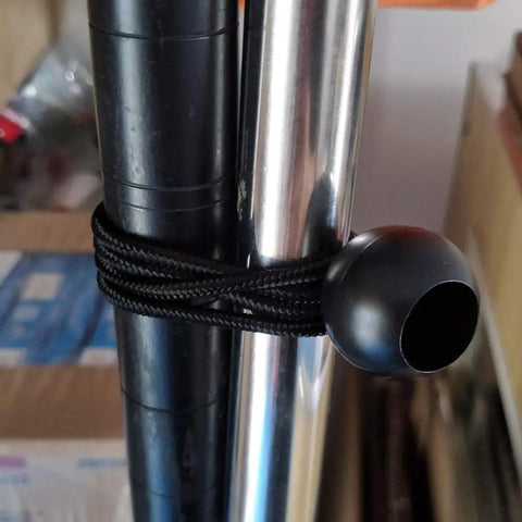 Heavy Duty Black Bungee Cords 4 Inch 50 Pack For Tarp Canopy Shelter Wall Pipes UV Resistant shown securing metal poles