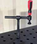 4-Pack 180 Degree Welding Fixture Screw Clamps For Five Eighth Inch Tables in use on weld station