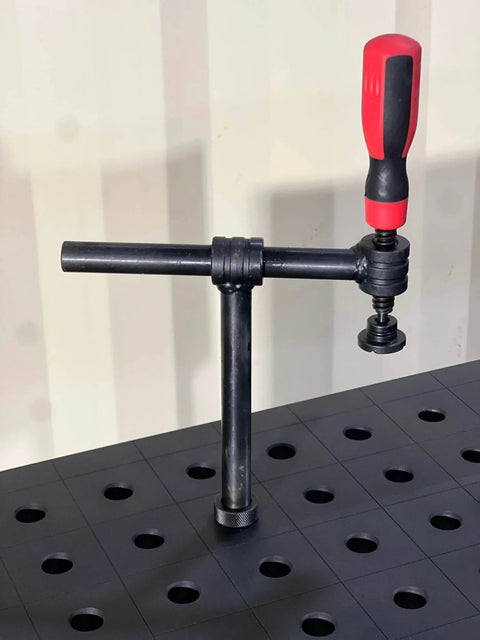 4-Pack 180 Degree Welding Fixture Screw Clamps For Five Eighth Inch Tables in use on weld station
