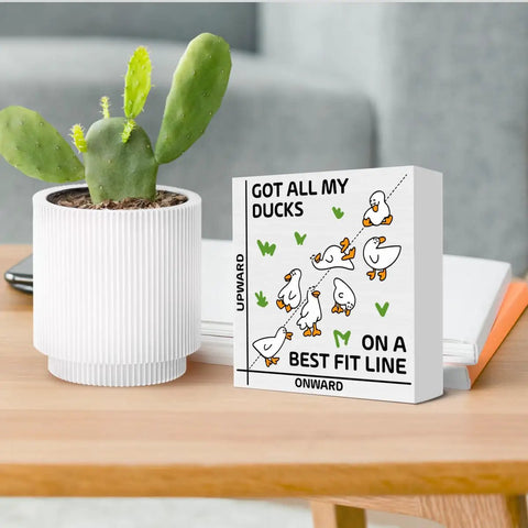 Funny Math Duck Wooden Box Sign Gift For Teachers And Math Nerds, 5x5 inches, on table beside a plant and books.