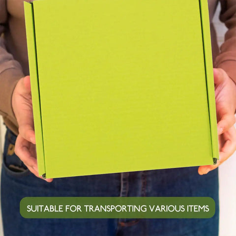 Person holding 10 Pack Green Corrugated Shipping Boxes For Mailing And Transport, Sturdy No Tape Or Glue Assembly