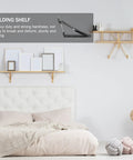 Heavy Duty Folding Black Iron Wall Brackets With Solid Support For Tough Durable Shelves in minimalist bedroom setting.
