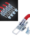 Four Piece Heavy Duty Toggle Clamps Set With Quick Acting Release Latch And No Fuss Adjustable Base Designed For Toolboxes And Woodworking Jigs Built Like A Brick For Reliable Daily Garage Tasks showing clamps with red handles and mounting plates.