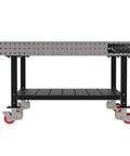 Hella Sturdy Heavy Duty Welding Fixture Table With Precision Laser Cut Industry Standard Holes And Locking Swivel Casters 60X60X36 Includes Shelf And Handle Made In Usa Silver side view showing caster wheels and support shelf.