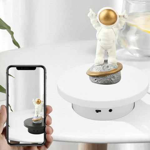 Top Tier Motorized Rotating Display Stand For Jewelry And Watches With 360 Degree Smooth Electric Turntable, 3KG Load USB Powered Platform Perfect For Pro Photography And Live Video Shows showcasing an astronaut figurine.