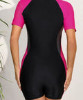 Back view of Womens Boyleg One Piece Rash Guard With Built In Bra And Zip Front UPF 50 Plus Short Sleeve Surfing Swimsuit Neon Pink Black Gray