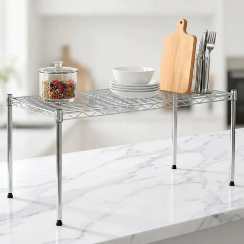 One Tier Steel Wire Shelving Unit With Adjustable Storage Rack Setup Measuring Thirty Inches By Fourteen Inches with plates and utensils.