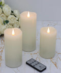 3 Pack Flickering Flameless LED Pillar Candles Battery Operated With Timer Real Wax Ivory 3D Moving Flame Creates Cozy Ambient Glow Last 1000 Plus Hours For Wedding Christmas Home Decor shown with remote on marble surface