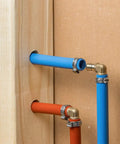 Blue and red PEX tubing connected with 50 Pack Half Inch Brass PEX Elbow Fittings For PEX Tubing, 90 Degree Connectors.