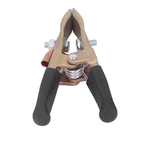 Heavy Duty Brass Welding Ground Clamp Rated For 500 Amps With Large 60mm Jaw Opening For Secure Earth Clip Hookups On Cars And Heavy Power Train Manufacturing Jobs You Can Count On Today. Image shows clamp with rubber grip handles and large jaw.