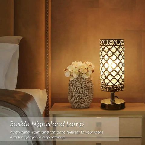 Crystal Table Lamps Set Of 2 With USB Charging Ports on a nightstand beside bed, with floral vase and warm light glow.