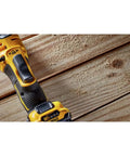 Close-up of Xtreme 12V Max Brushless Cordless Oscillating Tool With Quick Change Blades And Universal Adapter Bare Tool Only on wood surface