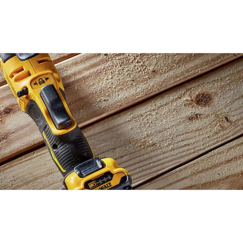 Close-up of Xtreme 12V Max Brushless Cordless Oscillating Tool With Quick Change Blades And Universal Adapter Bare Tool Only on wood surface