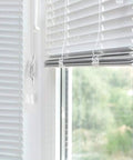 Rugged Zinc Alloy Cord Cleats For Blinds And Roman Shades Non Plastic Baby Safe Rope Holders With Screws shown installed on window frame.
