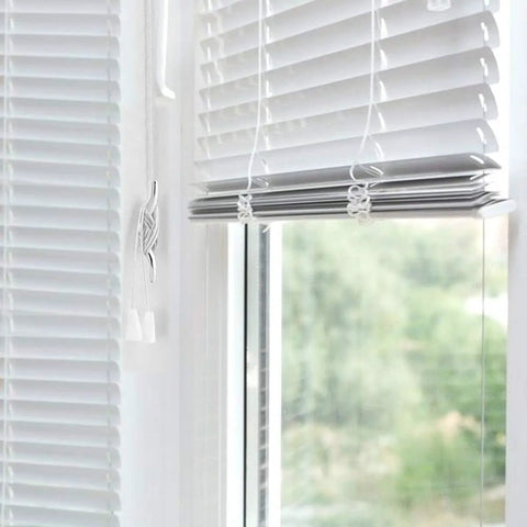 Rugged Zinc Alloy Cord Cleats For Blinds And Roman Shades Non Plastic Baby Safe Rope Holders With Screws shown installed on window frame.