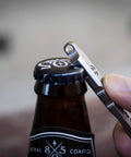 Titanium Ti Pry Mini Pry Bar Keychain EDC Pocket Pry Tool With Bottle Opener opening a bottle