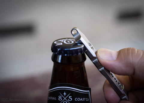Titanium Ti Pry Mini Pry Bar Keychain EDC Pocket Pry Tool With Bottle Opener opening a bottle