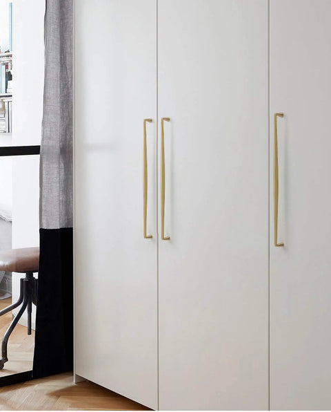 Bow Style Brass Cabinet Pulls For Kitchen And Bath on white wardrobe doors, sleek satin finish, easy install, 128mm center-to-center holes.