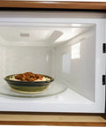 Bowl of food inside microwave with 10 Piece Microwave Mica Sheets Set For Replacement Mica Plates Heat Resistant Insulation visible.