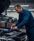 Mechanic using All In One Engine Diagnostic Kit With Heavy Duty Remote Starter Switch And Spark Plug Tester for engine analysis.