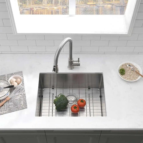 Deep 23 Inch Undermount Stainless Steel Kitchen Sink With 16 Gauge Single Bowl Ultra Durable Rust Resistant Easy Clean Ideal For Kitchen Or Laundry Room And Outdoor Utility Use installed in white countertop.