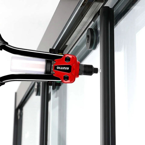 Beefy One Quarter Inch Rivet Gun Kit With 230 Rivets And Five Drill Bits Thirteen Inch Two Handed Riveter Tool Set in use on metal