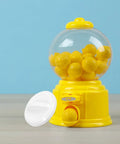 Upgrade Your Arcade Vibes With This Round Plastic Replacement Knob For Vending Machines And Party Games. A yellow gumball machine with round yellow balls.