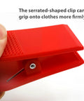 Close-up of red serrated clip from 3 Pack Universal Treadmill Safety Keys Magnetic Emergency Stop Key Set Red Blue Pink Color Coded Replacement Magnetic Safety Switch For Most Treadmills And Running Machines Quick Stop Protection.