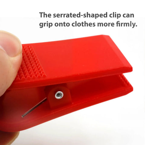 Close-up of red serrated clip from 3 Pack Universal Treadmill Safety Keys Magnetic Emergency Stop Key Set Red Blue Pink Color Coded Replacement Magnetic Safety Switch For Most Treadmills And Running Machines Quick Stop Protection.