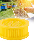 Six Piece Beekeeping Queen Rearing Box Kit With Plastic Queen Cages for isolation DIY queen production shown in beekeeping setting