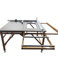 Heavy Duty 220 Volt Table Saw With Rugged Stand For Woodworking Crews featuring sliding table extension and folding cart.