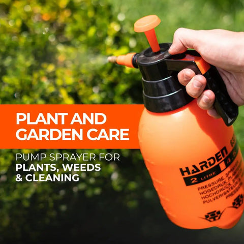 0.53 Gallon Handheld Pump Sprayer With Adjustable Copper Nozzle For Plants And Lawn Care being used in a garden