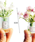 2 Pcs Pink Miniature Flower Vase Set With One Sixth Scale Straight Up Killer Details For Dollhouse Decor featuring white and pink flowers.