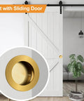 Image of a sliding barn door with Slick Round Finger Pull Set 2 Pack Brushed Gold Flush Recessed Door Handles installed.