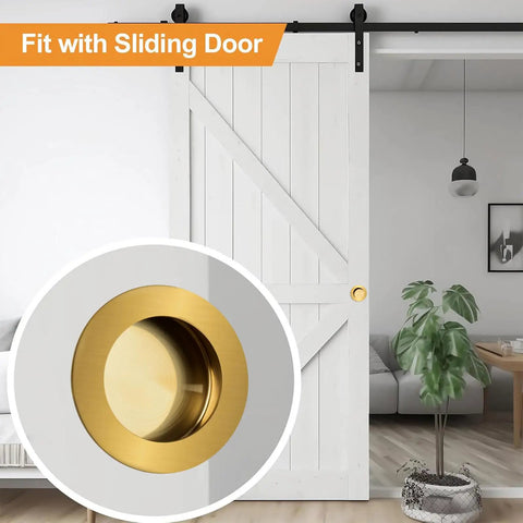 Image of a sliding barn door with Slick Round Finger Pull Set 2 Pack Brushed Gold Flush Recessed Door Handles installed.