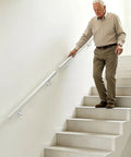 Wall Mounted Stair Handrail Dang Sturdy Stainless Steel Grab Bar For Indoor Outdoor Steps With Smooth Anti Slip Grip Support Holding Up To Two Hundred Pounds Heavy Duty Home Safety Rails, shown with an elderly man using it on stairs.
