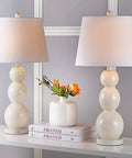 Jayne Modern Contemporary Glass 3 Sphere Table Lamps Set Of 2 In Light Gray With 28 Inch Tall Fabric Drum Shades LED Bulbs Included Perfect For Bedroom Living Room Office And Desk Lighting shown on a console table with a vase of flowers