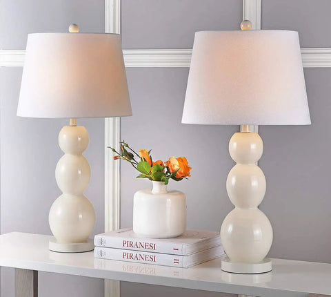 Jayne Modern Contemporary Glass 3 Sphere Table Lamps Set Of 2 In Light Gray With 28 Inch Tall Fabric Drum Shades LED Bulbs Included Perfect For Bedroom Living Room Office And Desk Lighting shown on a console table with a vase of flowers