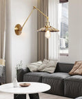 Badass Heavy Duty Swing Arm Wall Lamp, Adjustable Bronze Sconce in cozy living room setting with modern décor.