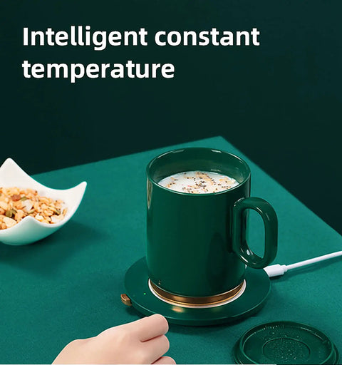 Smart Thermostatic Usb Coffee Mug Warmer Set To Keep Your Daily Brew Hot And Smooth Without Any Cold Cup Vibes Electric Heater Coaster on a green surface with snacks.